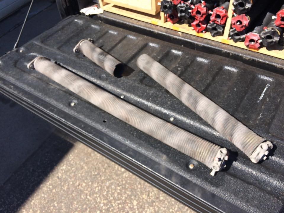 Repairing and Replacing Garage Door Springs